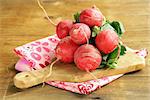 juicy ripe radish on a wooden table