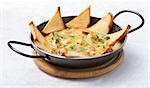 Photo preparation of hot meals with seafood chips and toast