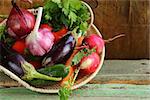 autumn harvest vegetables (eggplant, carrots, tomatoes, garlic)