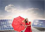 Composite image of elegant happy blonde holding umbrella