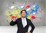 Composite image of smiling asian businessman pointing