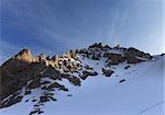 Group of hikers on snowy slope in early morning. Turkey, Central Taurus Mountains, Aladaglar (Anti Taurus).