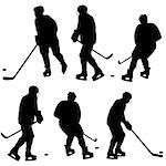 Set of silhouettes of hockey player. Isolated on white. Vector  illustrations.