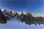 Hikers on snowy mountains in morning. Turkey, Central Taurus Mountains, Aladaglar (Anti Taurus).