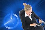 Composite image of blonde businesswoman sitting on swivel chair with tablet