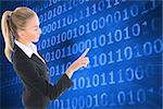 Composite image of blonde businesswoman pointing somewhere