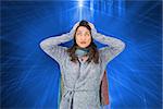 Composite image of anxious pretty brunette wearing winter clothes posing