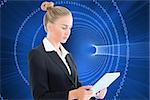 Composite image of blonde businesswoman holding tablet