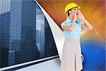 Composite image of attractive architect shouting at workers