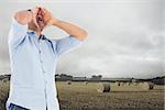 Composite image of shouting casual man standing