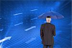 Composite image of mature businessman holding umbrella