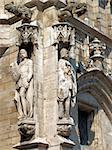 The facade of Brussels' Town Hall is decorated with numerous statues representing nobles, saints, and allegorical figures.