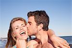 Close up portrait of couple on beach, Breezy Point, Queens, New York, USA