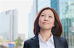 Smiling Young Businesswoman Looking Away