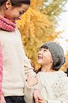 Mother and Daughter Enjoying a Park in Autumn