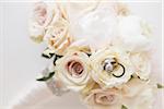 Close-up of Rings in Bouquet of Roses, Studio Shot