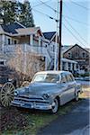 1950 Plymouth Deluxe Sedan Parked in front of House, Jacksonville, Oregon, USA