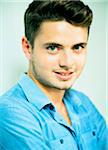 Close-up potrait of young man, studio shot