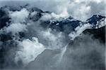 Overview of the Andes Mountains with clouds, at Machu Picchu in the Sacred Valley of the Incas, Peru