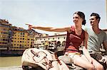 Man and woman by Ponte Vecchio, Florence, Tuscany, Italy