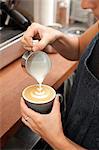 Barista preparing cappuccino