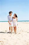 Couple walking on beach