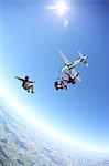 Skydivers free falling above Leutkirch, Bavaria, Germany