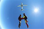 Female skydivers free falling above Leutkirch, Bavaria, Germany