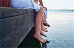 Close up of three males waist down outside sauna