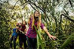 Five young women exploring marshland