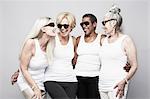 Studio portrait of senior women friends having fun