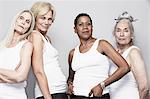 Studio portrait of senior women friends posing for camera