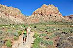 Female hiking Mount Wilson, Red Rock Canyon, Nevada, USA