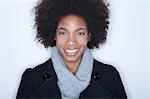 Studio portrait of young woman with afro