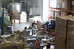 Factory workers in distribution warehouse