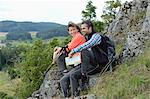 Couple taking a rest from their hiking tour