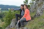 Couple taking a rest from their hiking tour