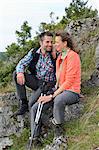 Couple taking a rest from their hiking tour