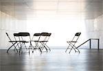 Empty office chairs arranged in circle