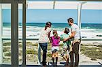 Family enjoying ocean view from patio