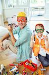 Father and son playing with construction toys