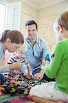 Father playing with children