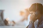 Businessman talking on telephone in office