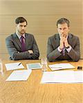 Businessmen sitting in meeting