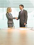 Business people shaking hands in meeting