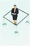Businesswoman standing in roped-off square