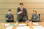 Businessman shaking his finger in meeting