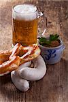 bavarian white sausages with bretzel and beer