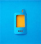 mobile phone paper symbol on blue background