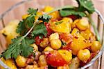 Salad of potato, chickpeas and mangoâ??s tossed with tangy spices and fresh herbs
